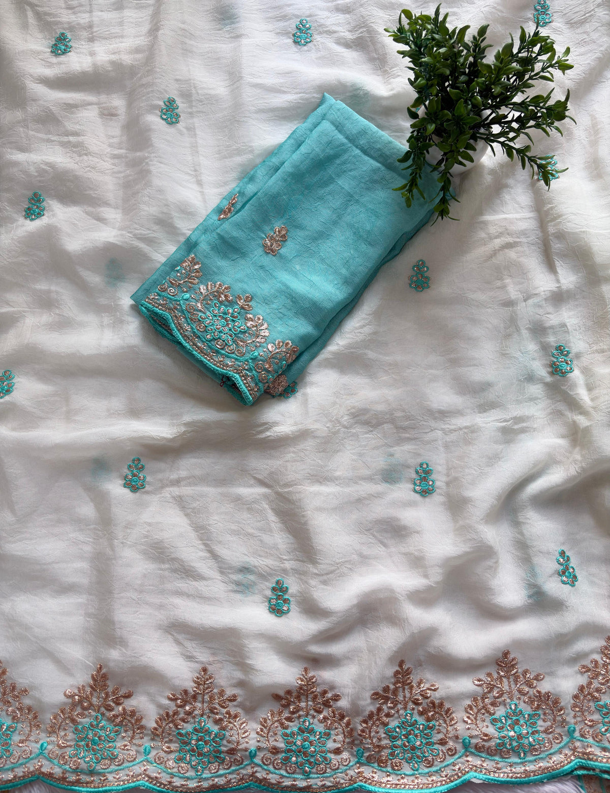 Designer saree with contrast blouse